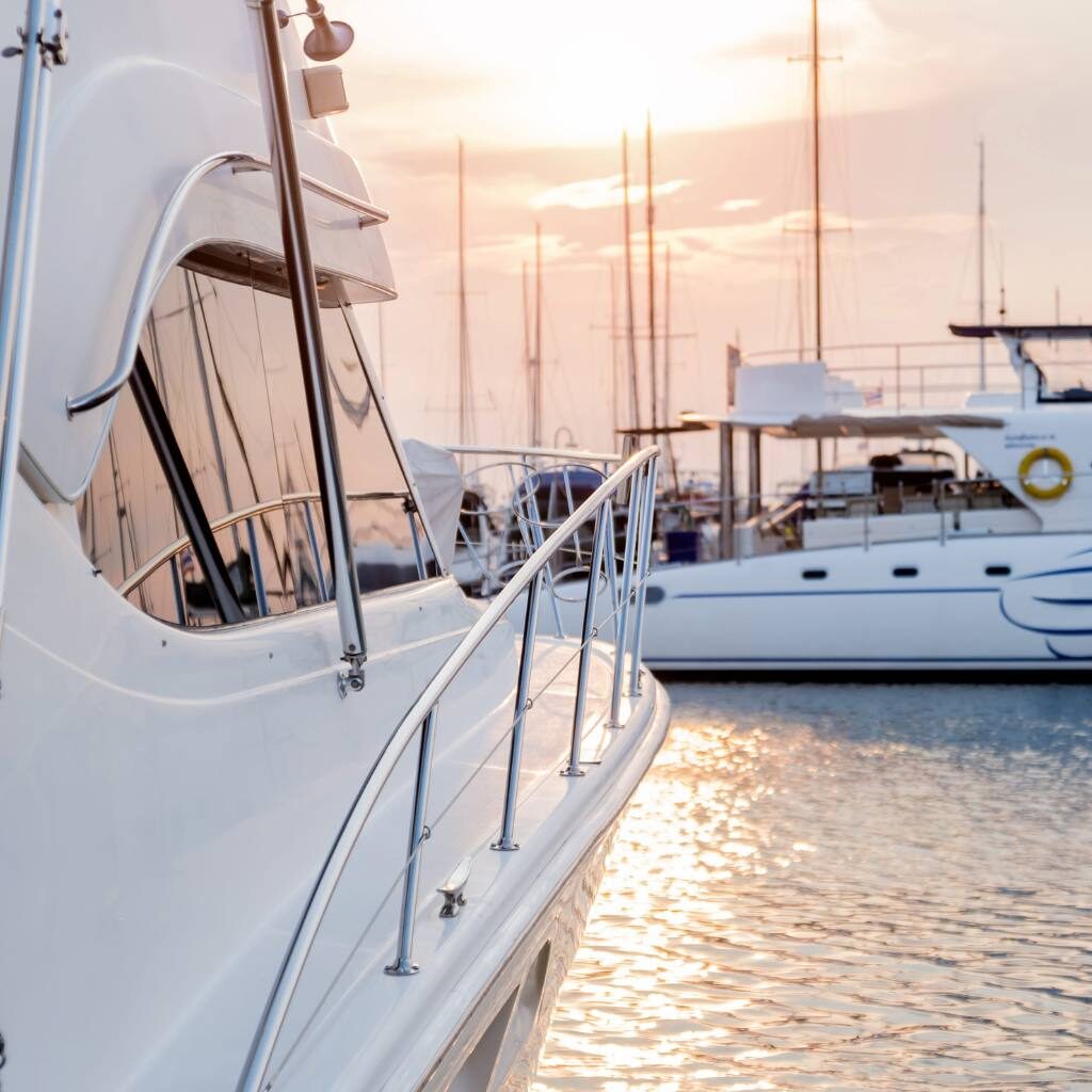 2 White Boats in a harbour