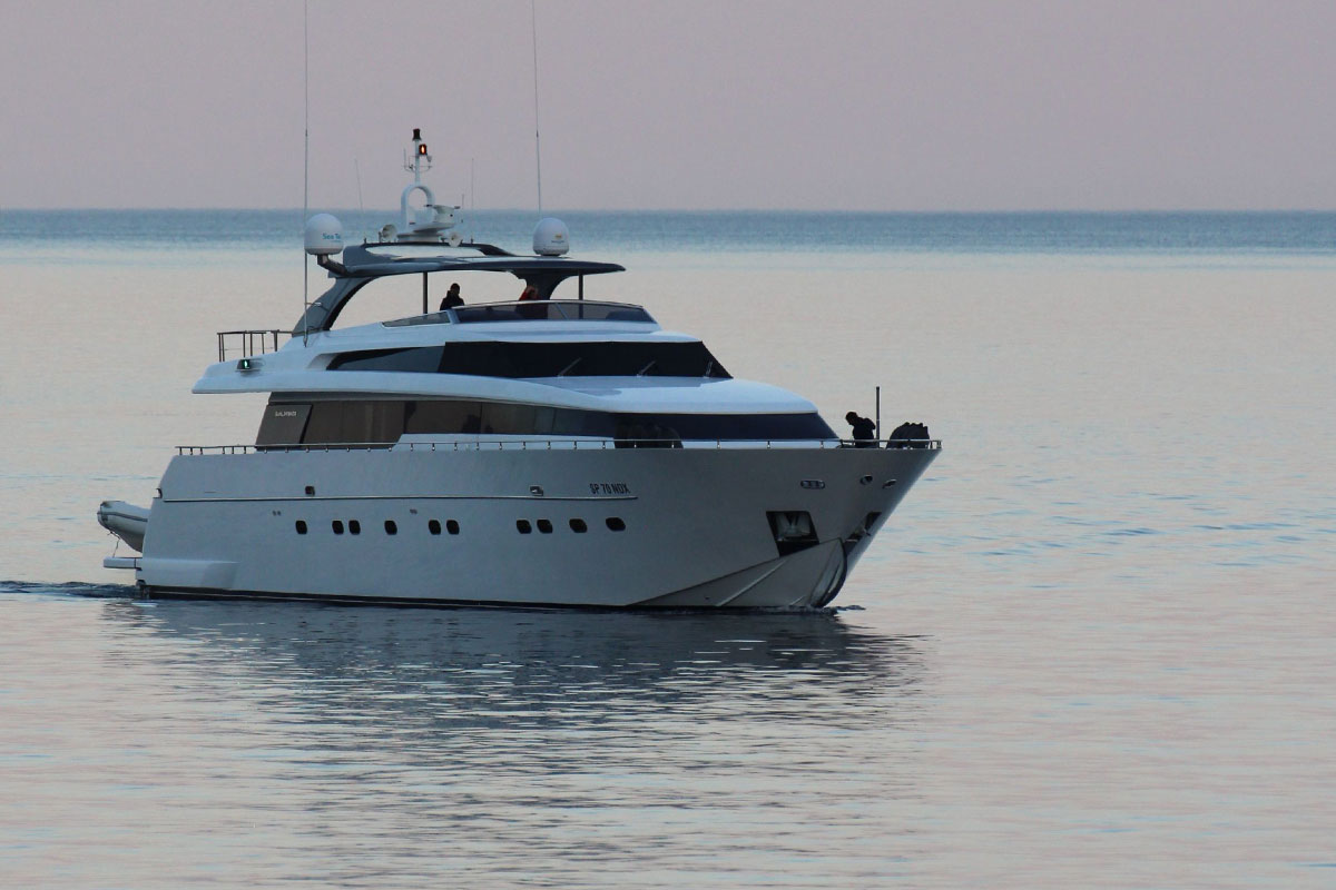 yacht pulling into harbour